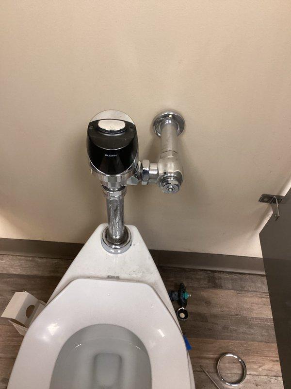 Successfully rebuilt commercial toilet flush valve by replacing Sloan solenoid and sensor components. Service included removal of existing flush mechanism, installation of new electronic sensor unit with chrome fittings, and verification of proper automatic flushing operation. Total service time: 2 hours.