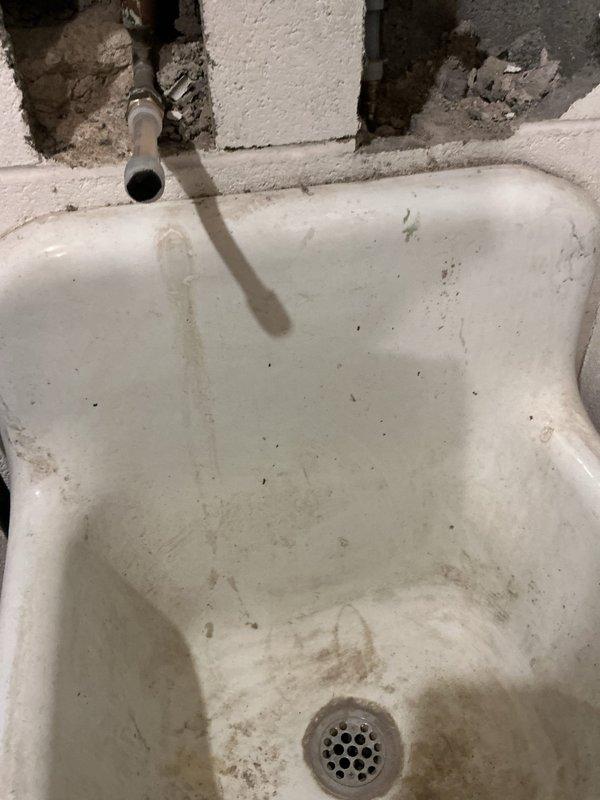 Installed new mop sink faucet in utility area after diagnosing missing main ball valve handle. Added necessary valve after the meter and completed plumbing connections by transitioning from existing metal pipe to PEX line, ensuring proper water supply to the fixture.