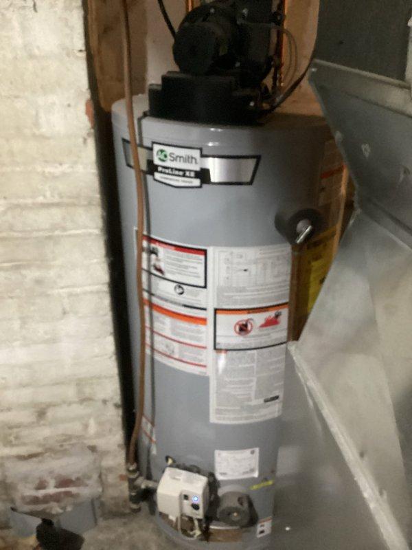 Responded to no hot water call for A.O. Smith water heater showing error code 6-3 (lost flame). Diagnosed dirty burner assembly affecting flame sensor operation. Performed cleaning of burner unit and thermocouple to remove accumulated debris causing ignition failure. Reset system after service, confirming proper operation and flame maintenance.