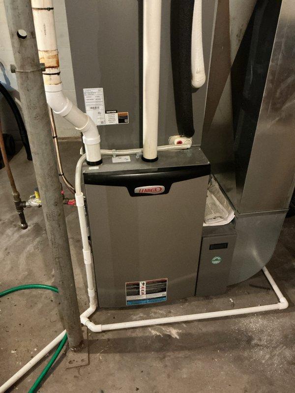 Responded to service call for insufficient hot water issue with a 13-year-old Richmond 50-gallon electric water heater. Diagnostic testing revealed failed heating elements. Removed existing unit and installed new Bradford White 50-gallon electric water heater, completing all necessary connections and testing for proper operation.