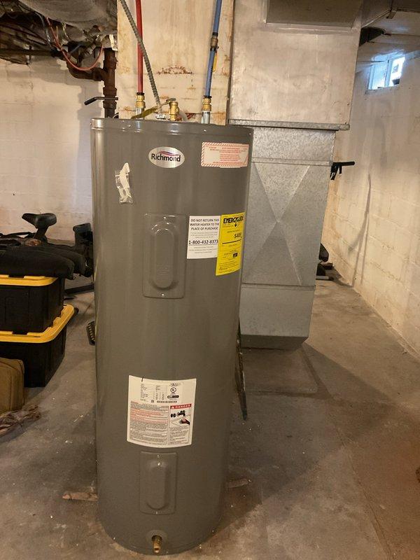 Performed furnace tune-up on 1995 Trane 80% efficient natural gas furnace that replaced previous oil furnace. Conducted thorough inspection including heat exchanger evaluation with no crimp cracks detected and carbon monoxide testing showing 0 ppm after 10+ minutes of operation. Homeowners plan to replace both furnace and chimney in the future.