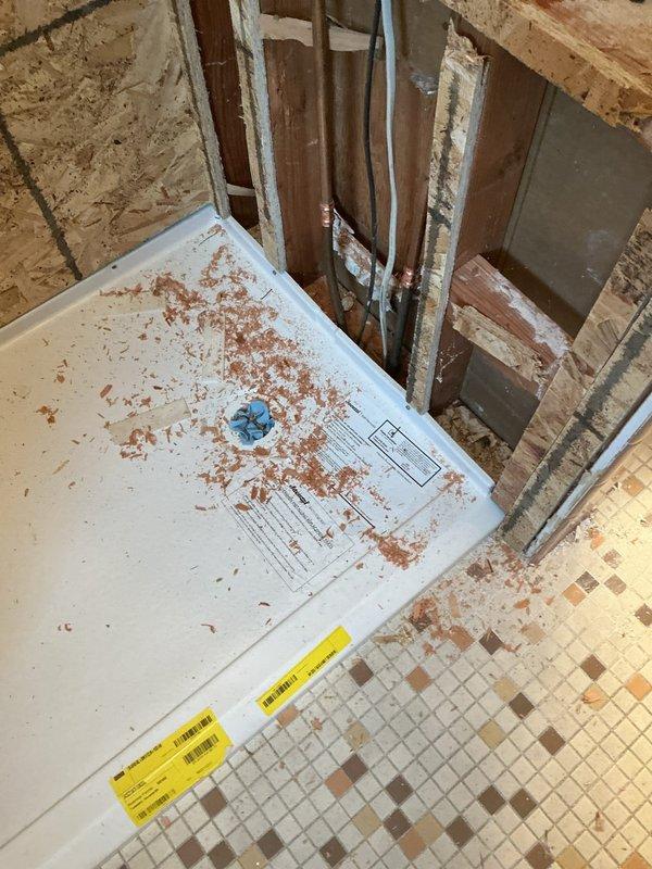 Installed customer-provided vanity but was unable to complete full installation due to incompatible fixtures (single-hole vanity top with three-hole faucets). Partial payment collected for completed work. Will return to install faucets and drains once customer acquires compatible fixtures.