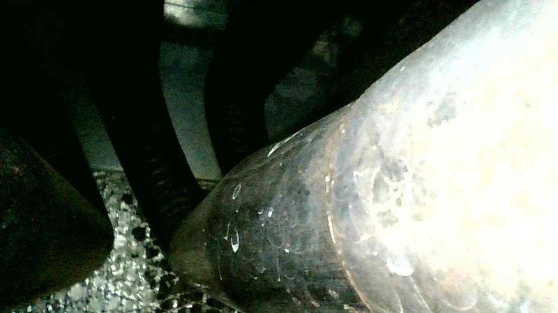 Responded to emergency no-heat call for furnace failure. Diagnosed multiple issues including tripped rollout switch, severely clogged condensate drain with insect debris, and compromised secondary heat exchanger with visible holes and cracks. Reset rollout switch temporarily restoring operation, but due to safety concerns with the cracked heat exchanger, tagged unit out of service. Recommended complete furnace replacement based on age and condition of equipment. Scheduled follow-up consultation for replacement options.