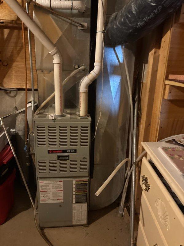 Responded to LP furnace service call due to loud noise and burning odor. Diagnostic inspection revealed mouse in blower wheel, cracked heat exchanger, and significant inducer leak. Due to safety concerns with the heat exchanger, scheduled service advisor visit to provide repair options and replacement estimate.