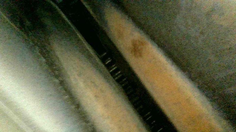 Responded to no heat complaint for aging natural gas furnace. Diagnosed blower motor locked up and failed thermostat. Performed comprehensive safety inspection with no immediate hazards found, replaced thermostat to restore basic functionality, and scheduled follow-up consultation for replacement options due to unit's overall deteriorated condition and age.