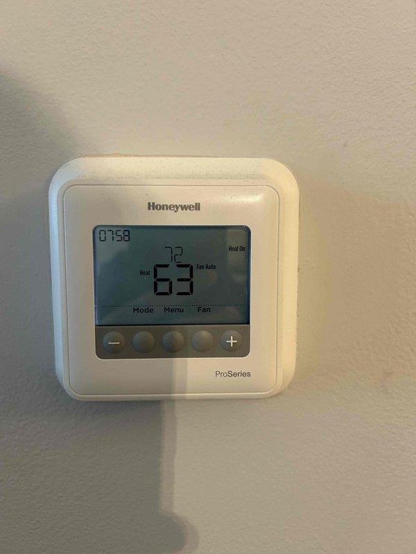 Diagnosed no heat issue on 29-year-old Bryant furnace that previously had inducer motor and gas valve replacement. Performed gas pressure testing at low and high fire settings. Identified excessive airflow noise during operation; removed air filter for testing which significantly reduced noise and lowered supply air temperature by 30°F. Determined root cause was severely restricted airflow from dirty filter. Replaced with new MERV 8 filter, restoring proper system operation.