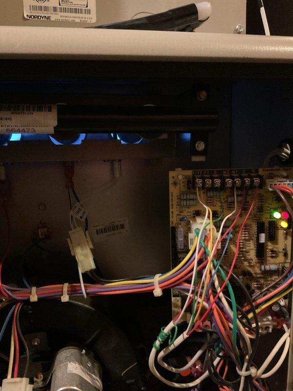 Responded to service call for a furnace with intermittent heating issues. Diagnosed system showing alternating red/green error lights. Hot surface ignitor was functioning properly, but gas valve was receiving constant 26-27V power. Upon testing, furnace operated normally multiple times after reconnecting gas valve. Discussed repair versus replacement options with homeowners given the age and budget-friendly nature of the unit.