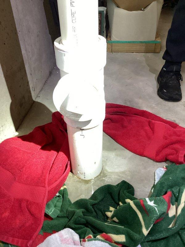 Cleared obstruction in 4-inch backup line and addressed leak under water source. Replaced damaged cleanout fitting with new PVC component after finding cracked cleanout and empty pipe. Installation successfully completed with proper connections to restore proper drainage function.