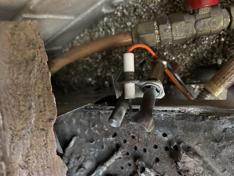 Responded to service call for CFL-24NG gas log fireplace experiencing intermittent operation issues. Diagnostic inspection revealed adequate supply pressure (above 5" WC) despite long gas line run through attic and basement. Identified delayed gas shutoff in pilot assembly after flame extinguishment as likely cause of operational problems. Recommended replacement of gas valve and pilot assembly to resolve intermittent operation.