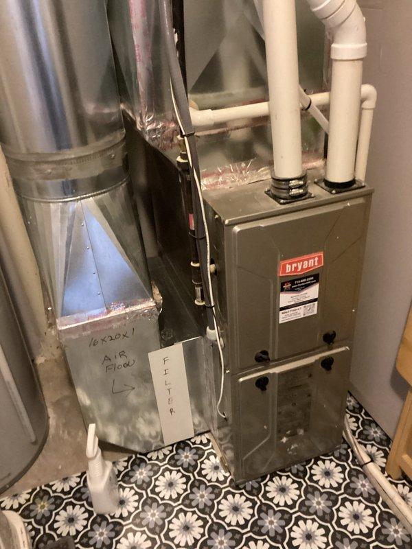 Performed Family Rewards furnace tune-up service, including flame sensor cleaning, condensate trap flush, and air filter replacement. Conducted thorough inspection of heat exchanger, blower wheel, and ignitor components, all found in good working condition. System started properly with no operational issues identified.