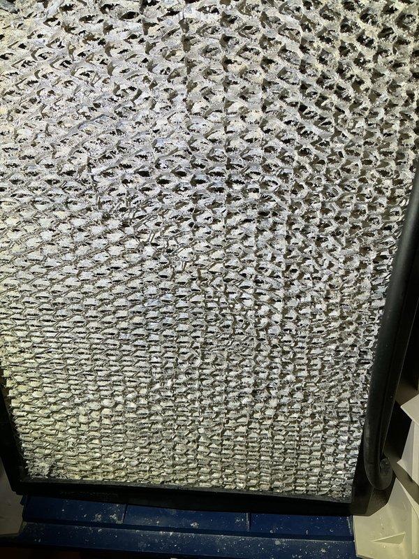 Performed non-member tune-up on 16-year-old gas furnace. System inspection revealed significant dust accumulation on air filter requiring replacement and notable corrosion on copper gas line connections at the Honeywell valve. Customer has maintained regular service intervals, previously addressing inducer leak and replacing blower as needed.