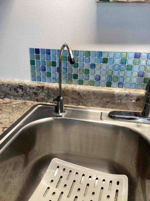 Completed scheduled maintenance on residential reverse osmosis water treatment system. Replaced three filters on one-year-old RO unit according to manufacturer specifications. System was tested after filter replacement and is functioning properly with no leaks observed.