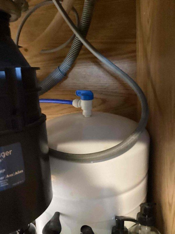 Completed scheduled maintenance on residential reverse osmosis water treatment system. Replaced three filters on one-year-old RO unit according to manufacturer specifications. System was tested after filter replacement and is functioning properly with no leaks observed.