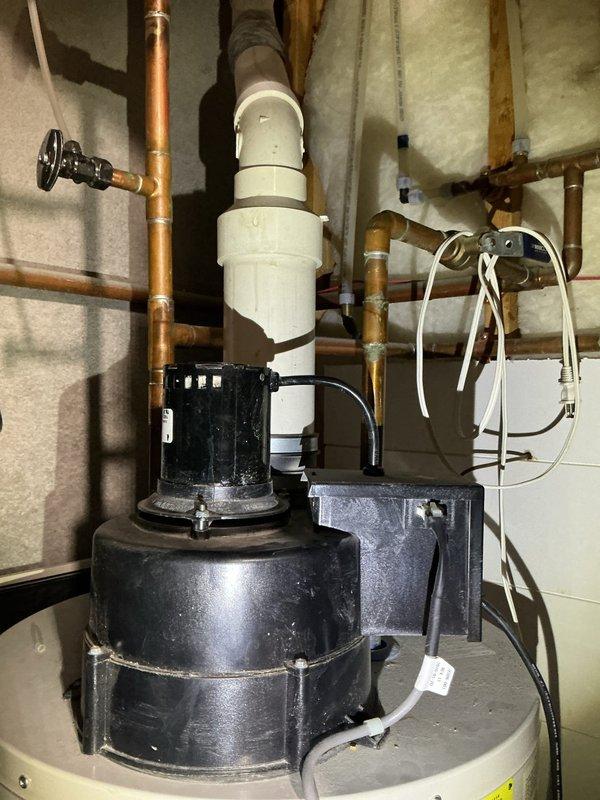 Responded to service call for non-functional water heater displaying diagnostic codes (green and yellow indicator lights). Diagnosed faulty control valve on Intelli-Vent system. Recommended replacement of valve assembly to restore proper heating function. Customer referred to comfort advisor for replacement options.