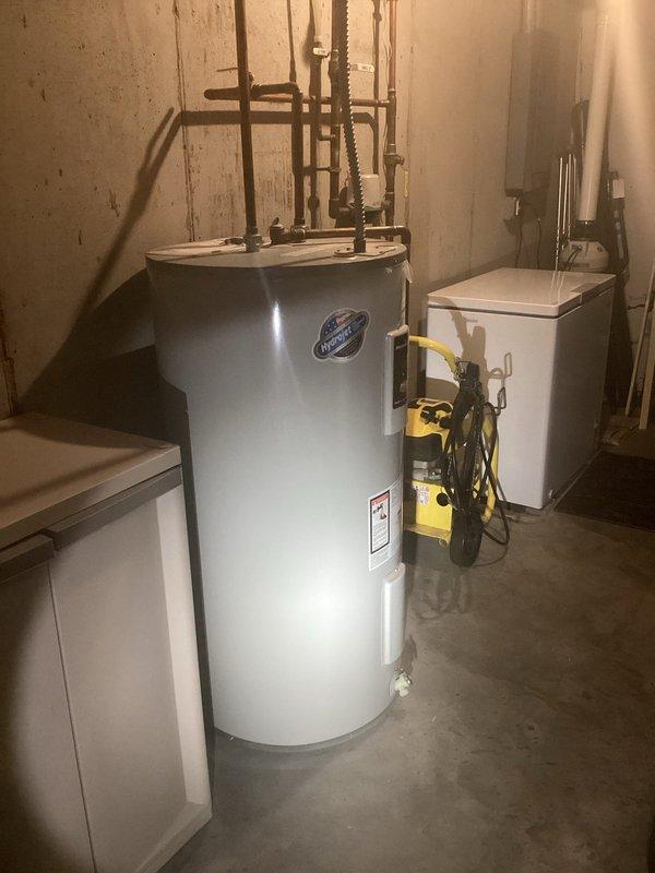 Conducted comprehensive plumbing inspection with water testing as requested. All plumbing systems functioning properly with no major issues detected. Observed minor corrosion on angle stop feeding dishwasher under kitchen sink; documented condition with photos of water heater installation and PVC piping configuration in utility area.