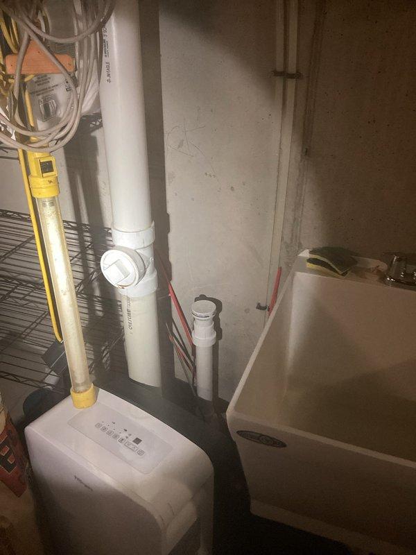 Conducted comprehensive plumbing inspection with water testing as requested. All plumbing systems functioning properly with no major issues detected. Observed minor corrosion on angle stop feeding dishwasher under kitchen sink; documented condition with photos of water heater installation and PVC piping configuration in utility area.