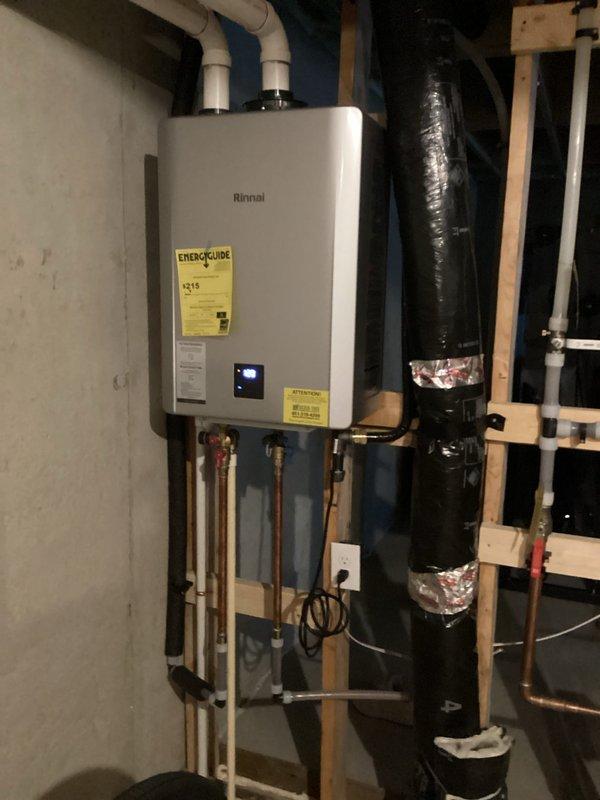 Performed scheduled maintenance service on Rinnai tankless water heater. Completed comprehensive system flush to remove mineral buildup and sediment, restoring optimal performance and efficiency. Inspected all connections, venting system, and verified proper operation after service.