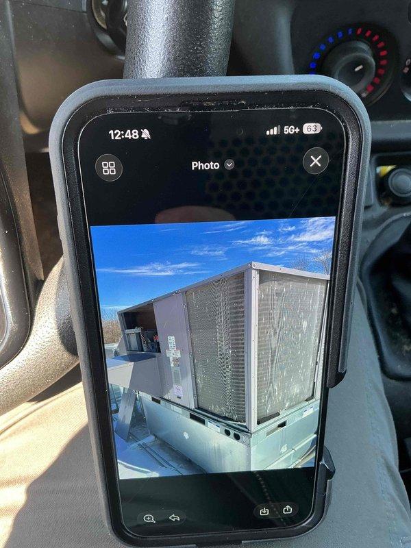Completed scheduled filter replacement maintenance on two rooftop units (Daikin RTUs) per maintenance agreement. Replaced four 16x16x2 filters and two 20x25x2 filters, then dated all new filters for tracking purposes. Documented completion with photos of equipment.