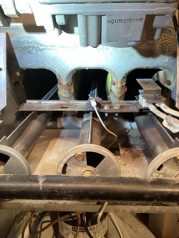 Performed furnace tune-up on 34-year-old system including flame sensor cleaning, condensate drainage verification, and electrical component inspection. Heat exchanger was examined with no concerning issues found. System was tested and confirmed to be operating properly. Homeowner elected to continue using existing equipment as it remains functional with no reported problems.