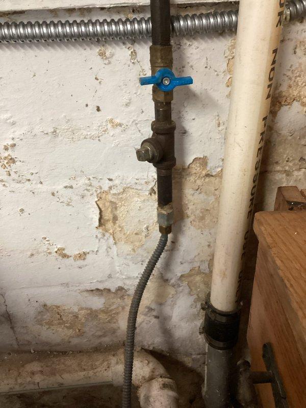 Disconnected gas line to dryer and capped off for customer's conversion from gas to electric dryer. Shut off gas supply valve to the line, performed leak test after capping to verify integrity of seal, then closed valve. Documented work with photos for reference. No leaks detected.