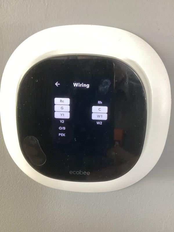 Responded to service call for furnace with thermostat rebooting issues and non-functioning humidifier. Diagnosed and repaired disconnected common wire at thermostat, restored proper connection and verified settings. Serviced humidifier by opening closed water supply valve above water heater and replaced clogged air filter with customer-provided unit. All systems restored to normal operation.