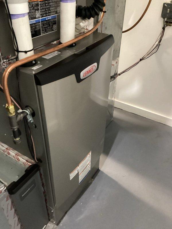 Completed warranty service on Lennox heating system by replacing faulty sensor as part of RDS kit repair. Inspection included verification of proper ventilation connections and examination of adjacent RUUD water heater installation to ensure no interference with HVAC operation.