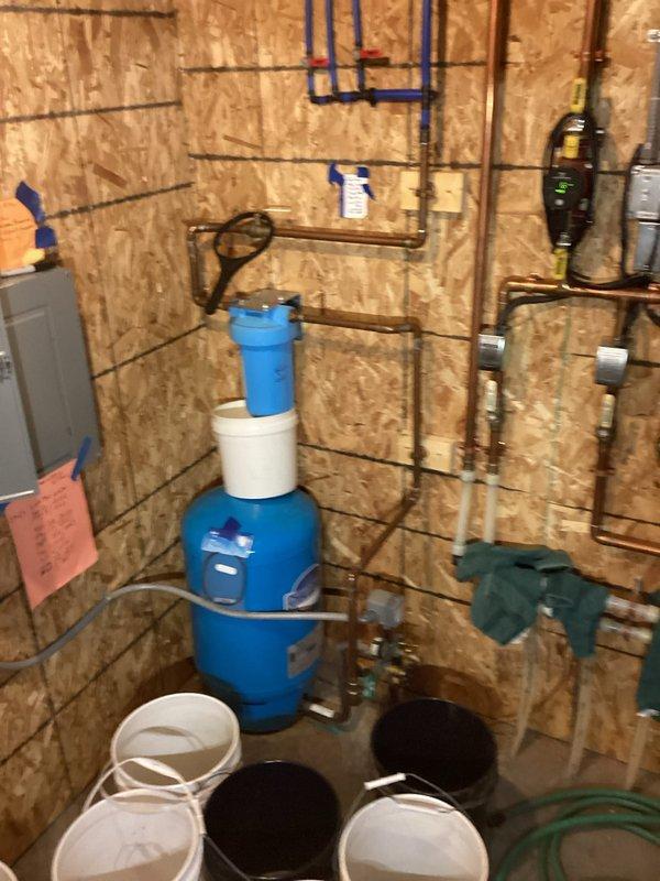 Performed inspection of leaking water heater system with two tanks. Documented existing A.O. Smith water heaters and associated plumbing infrastructure. Customer approved replacement of both the main water heater tank and the D super heater tank that feeds into it. Also noted intermittent water supply issues potentially related to well pump pressure switch that will need evaluation during replacement service.