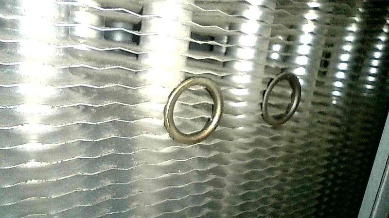Responded to "no heat" service call for a 36-year-old Heil furnace. Inspection revealed two popped rings on secondary heat exchanger, confirming heat exchanger failure. Equipment was tagged out of service due to safety concerns and scheduled follow-up with service advisor for replacement options.