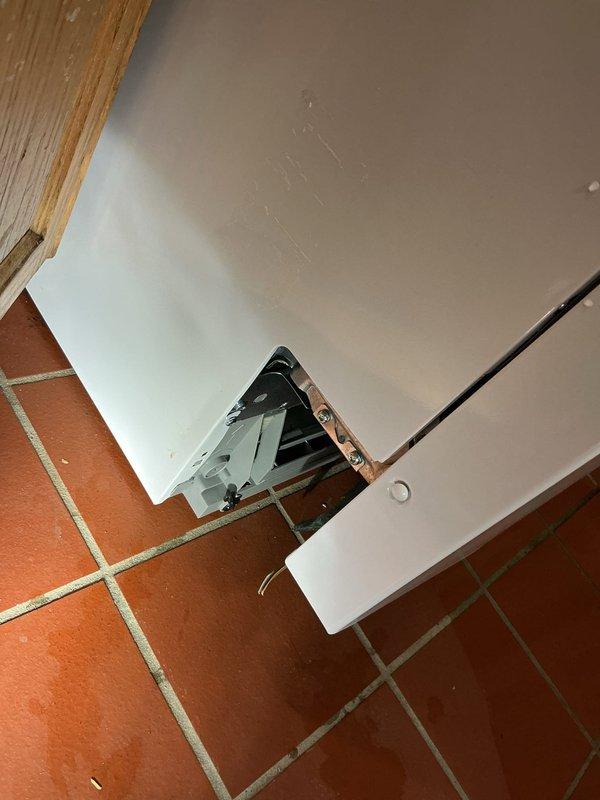 Responded to service call regarding dishwasher drainage issue. Inspected unit and connections, determining all plumbing connections were intact and functioning properly. Discovered internal leak in dishwasher catch pan unrelated to plumbing work; advised customer to contact appliance manufacturer for warranty service.