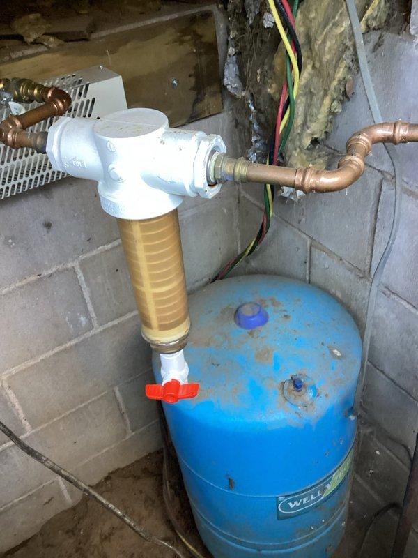 Replaced leaking 50-gallon electric water heater with new unit featuring minimum 10-year warranty. Inspected well system during service, noting proper connection to existing plumbing infrastructure and ensuring adequate water pressure. Installation completed successfully, restoring hot water service to the residence.
