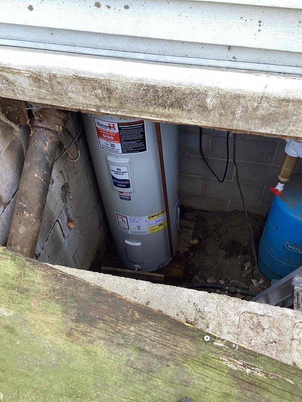Replaced leaking 50-gallon electric water heater with new unit featuring minimum 10-year warranty. Inspected well system during service, noting proper connection to existing plumbing infrastructure and ensuring adequate water pressure. Installation completed successfully, restoring hot water service to the residence.