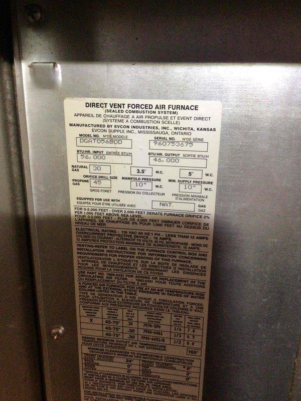Performed diagnostic service on a 30-year-old Evcon direct vent forced air furnace (Model DGR105S8DD) that was experiencing short cycling and no air flow. Identified multiple issues including a cracked heat shield, though heat exchanger remained intact. Restored basic functionality and advised customer on replacement options through service advisor due to unit's advanced age and condition.