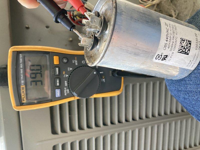 Performed comprehensive maintenance on 16-year-old HVAC system including furnace and AC tune-up per non-member service request. Tested capacitor with multimeter showing reading of 63, and inspected metal components for wear. System is operational but showing age-related deterioration; customer has been informed of worn parts and replacement options have been provided via email.