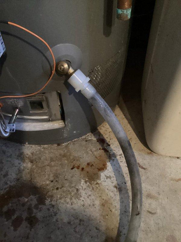 # Water Heater Tune-Up and Inspection

Performed comprehensive tune-up and inspection on existing tanked water heater for homeowner preparing property for sale. Upon arrival, conducted thorough visual assessment of unit to determine age and operational condition. Inspected all major components including tank exterior, pressure relief valve, drain valve, gas connections, venting system, and burner assembly. Checked for signs of corrosion, leaks, or structural compromise on tank body and surrounding plumbing connections.

Tested temperature and pressure relief valve for proper operation and verified discharge pipe configuration meets safety standards. Examined anode rod condition (where accessible) and assessed sediment buildup potential. Inspected gas line connections for leaks using approved detection methods and verified proper combustion air supply. Evaluated flue pipe integrity and secure attachment to ensure safe exhaust ventilation.

Flushed sediment from tank bottom to improve he