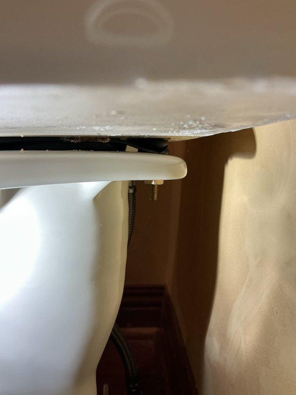 # Plumbing Service Report

Responded to service call for multiple toilet issues affecting four fixtures in residential property. Two toilets exhibited leaking problems while two others were continuously running, resulting in water waste and potential damage.

Completed full replacement of one severely compromised toilet with new Gerber unit, ensuring proper installation and seal integrity. Addressed fill valve failure in second toilet by installing new component to restore proper tank filling function and eliminate running water issue. Replaced worn flapper in third toilet to correct inadequate seal causing continuous water flow into bowl. Installed new flush valve assembly in fourth toilet to resolve leaking condition and restore proper flushing mechanism operation.

Conducted comprehensive leak inspection of all repaired fixtures to verify watertight connections and proper operation. All toilets tested and confirmed functioning correctly upon completion. Documented work with photogra