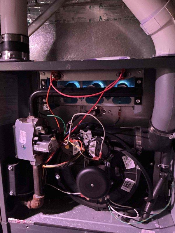 # HVAC Service Report - No Heat Call

## Service Summary
Responded to no heat call on 7-year-old Goodman furnace with burner repeatedly shutting down. Diagnosed dirty flame sensor reading 0.2 microamps, cleaned sensor to restore proper operation with reading of 2.4 microamps, restoring heat to residence.

## Work Performed

Arrived on site to diagnose furnace experiencing repeated burner shutdowns with no heat output. Upon inspection of the combustion assembly, identified flame sensor as primary issue with weak microamp reading of 0.2μA, well below the minimum threshold required for proper flame rectification and burner operation.

Removed and thoroughly cleaned flame sensor rod to remove carbon buildup and oxidation. Reinstalled sensor and verified proper positioning in flame path. Confirmed restored functionality with multimeter reading of 2.4 microamps, indicating adequate flame rectification signal for reliable burner operation.

During comprehensive system inspection, observed ign