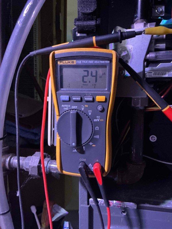 # HVAC Service Report - No Heat Call

## Service Summary
Responded to no heat call on 7-year-old Goodman furnace with burner repeatedly shutting down. Diagnosed dirty flame sensor reading 0.2 microamps, cleaned sensor to restore proper operation with reading of 2.4 microamps, restoring heat to residence.

## Work Performed

Arrived on site to diagnose furnace experiencing repeated burner shutdowns with no heat output. Upon inspection of the combustion assembly, identified flame sensor as primary issue with weak microamp reading of 0.2μA, well below the minimum threshold required for proper flame rectification and burner operation.

Removed and thoroughly cleaned flame sensor rod to remove carbon buildup and oxidation. Reinstalled sensor and verified proper positioning in flame path. Confirmed restored functionality with multimeter reading of 2.4 microamps, indicating adequate flame rectification signal for reliable burner operation.

During comprehensive system inspection, observed ign