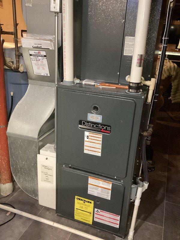 # HVAC Maintenance Service Report

Performed comprehensive furnace tune-up on a 14-year-old Distinctions by Amana gas furnace system. Conducted thorough inspection of heat exchanger with no defects found. Cleaned flame sensor, burner assembly, and condensate system to ensure optimal operation. Verified all components functioning properly upon completion of maintenance service.