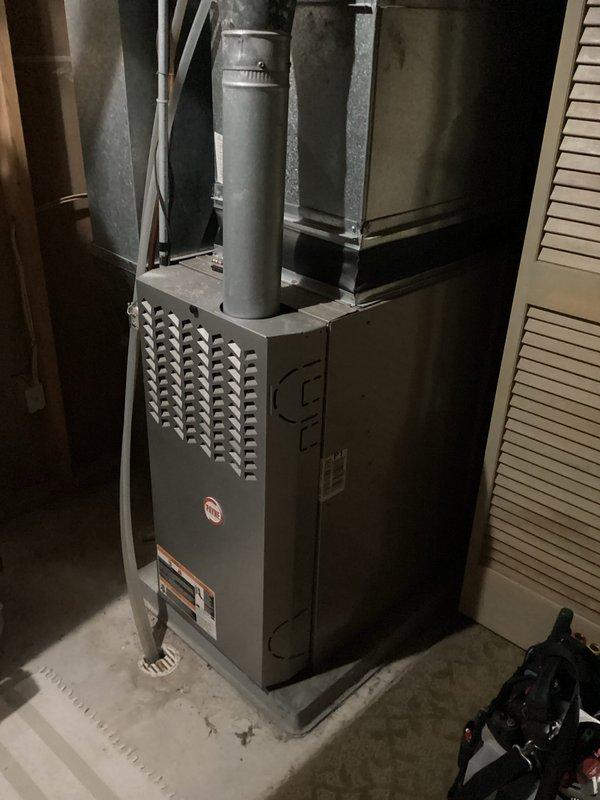 Completed comprehensive furnace tune-up including inspection of heat exchanger, cleaning of flame sensor, and testing of all electrical components which were found to be within specifications. Corrected improper filter installation by removing one of two 1-inch filters that were incorrectly stacked in the filter slot and advised homeowner that single filter installation prevents potential overheating issues and ensures proper airflow. Verified furnace startup sequence and confirmed all systems operating correctly with no concerns identified.