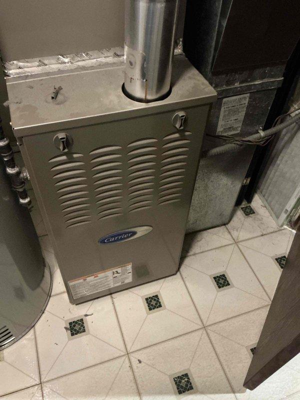 Completed phone follow-up regarding service questions from earlier job site visit. Documented HVAC system including Carrier furnace and air handler unit, as well as water heater installation in basement mechanical room. Contacted customer and provided toilet replacement bids as requested.