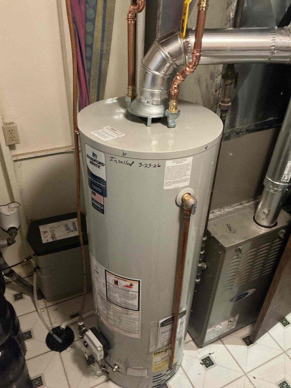 Completed phone follow-up regarding service questions from earlier job site visit. Documented HVAC system including Carrier furnace and air handler unit, as well as water heater installation in basement mechanical room. Contacted customer and provided toilet replacement bids as requested.