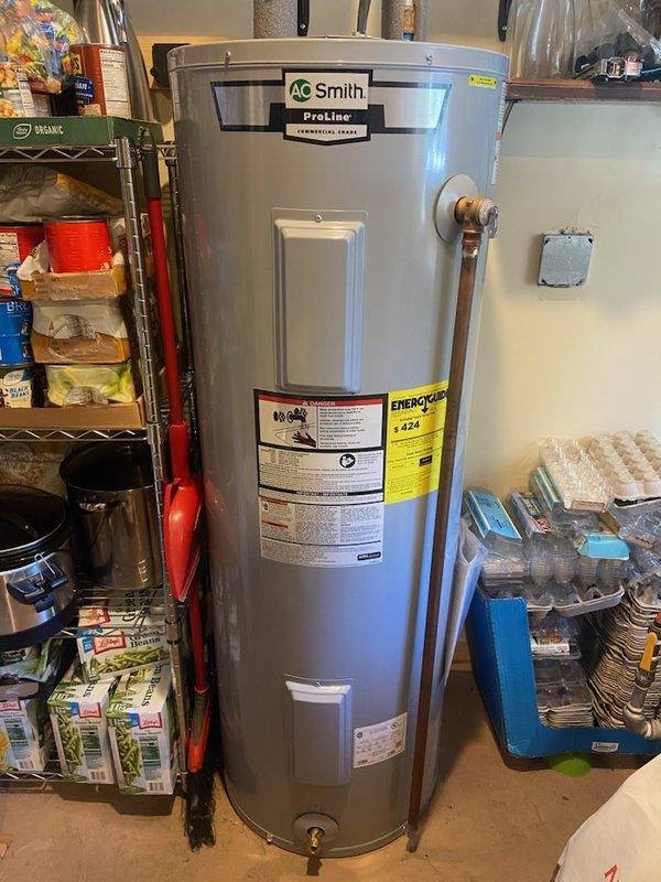 Responded to no hot water complaint on a 2021 A.O. Smith electric water heater. Upon inspection, found the high-limit reset button tripped on the thermostat. Diagnosed failed thermostats and heating elements on the unit. Replaced both upper and lower thermostats and heating elements under warranty coverage. Restored full hot water functionality and verified proper operation. Customer also requested evaluation of slow-draining shower, which was assessed during the visit.