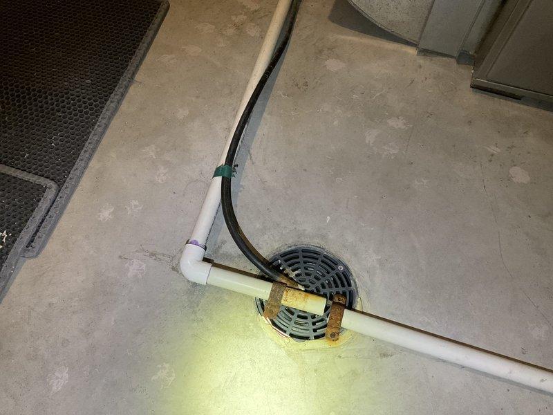 Completed comprehensive plumbing inspection identifying three code deficiencies requiring attention. Found cold water supply issue at water heater, missing air gap on water softener discharge line, and absent standpipe for bar dishwasher drain connection. Documented all findings with photographs and provided written estimates for corrective work to bring installations into compliance with current plumbing standards.