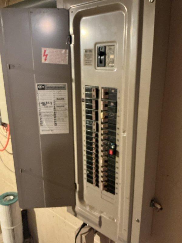 Responded to emergency call for well system leak with water gushing from plumbing connections leading to pressure tank. Upon inspection, identified failed factory-soldered joints on tank tee fitting between well and pressure tank. Removed defective tank tee assembly and installed new tank tee with all necessary components including isolation valves, pressure switch, and pressure gauge to restore proper well system operation and eliminate active leak.
