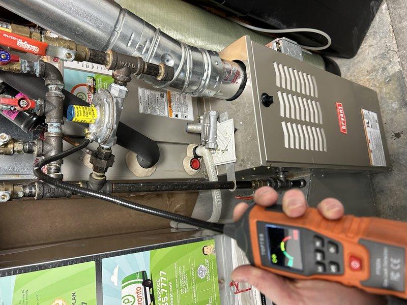Responded to gas leak emergency after utility company shut off gas supply to residence due to leaking pressure regulator on gas line upstream of furnace. Performed diagnostic testing with combustible gas detector to verify leak location at regulator assembly. Replaced defective gas pressure regulator with new unit, including all associated fittings and connections. Pressure tested entire gas line system to ensure integrity of repair, confirmed no additional leaks present, and verified proper gas pressure at appliance. Coordinated with homeowner for site access and restored gas service upon successful completion of repairs and safety checks.