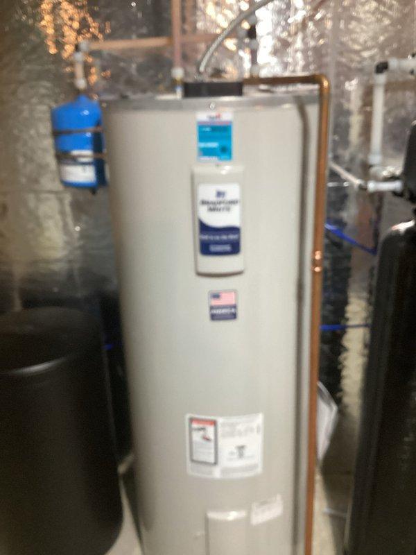 Completed comprehensive plumbing inspection of newly installed mechanical systems including water heater, sediment filtration system, and blue storage/treatment tank. All components verified to be functioning properly with correct installations and connections. Advised homeowner to monitor evaporative cooler and toilet flappers for potential future maintenance needs.