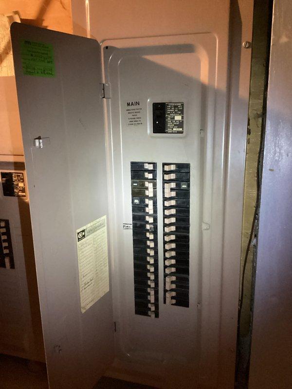 Responded to a main drain backup issue with secondary drainage problems affecting the kitchen sink and floor drain. Upon arrival, accessed the property through the garage and located the clogged floor drain in the basement utility area. Deployed cable equipment to clear the main line obstruction, which was determined to be caused by scale buildup within the drainage system. Successfully cleared the blockage and restored proper flow to both the main drain line and kitchen sink drain. Documented the water heater and electrical panel locations in the mechanical room for service records.