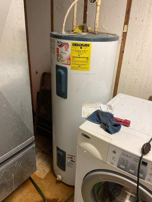 Responded to no heat call on 20+ year old Lennox pulse furnace that was making buzzing noise when activated. Diagnosed condensate drip leg plugged with sediment causing water backup in furnace, preventing operation. Removed drip leg, cleared sediment and condensate buildup, installed fernco coupling, and reassembled system. Performed complimentary pressure test on pulse furnace heat exchanger which passed successfully, confirming heat exchanger integrity and safe operation.