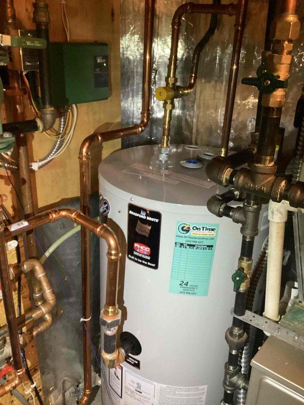 Responded to callback for boiler system losing water pressure after multiple previous visits. Isolated heating zones and in-floor system to diagnose pressure loss, with only the indirect domestic hot water tank remaining connected to the boiler. System pressure dropped to 4 psi twice in this configuration, identifying the indirect tank as the source of the pressure loss. Documented equipment information and submitted warranty claim for the defective indirect water heater tank.