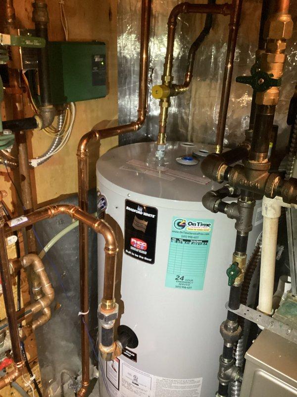 Responded to callback for boiler system losing water pressure after multiple previous visits. Isolated heating zones and in-floor system to diagnose pressure loss, with only the indirect domestic hot water tank remaining connected to the boiler. System pressure dropped to 4 psi twice in this configuration, identifying the indirect tank as the source of the pressure loss. Documented equipment information and submitted warranty claim for the defective indirect water heater tank.